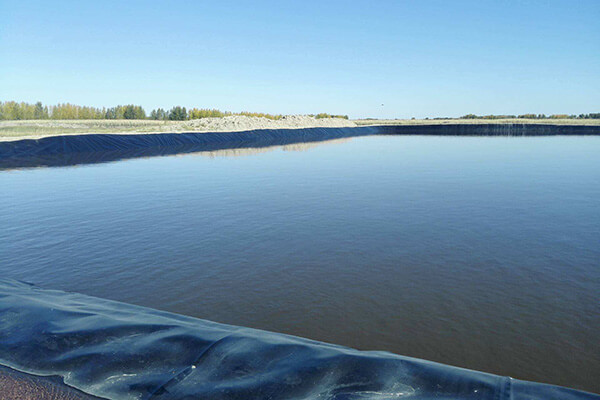 The impact of geomembrane rupture